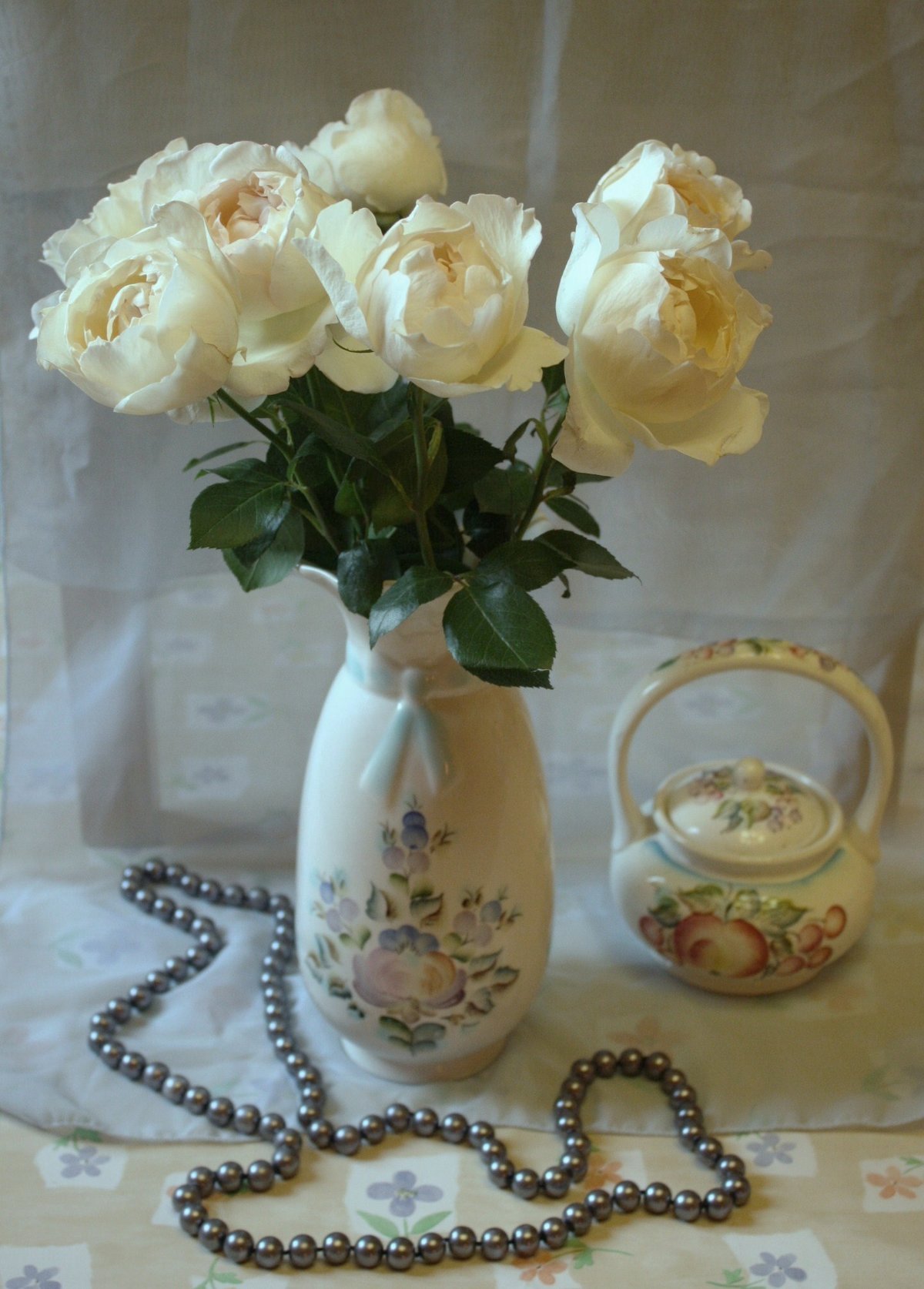 Букеты роз в вазах