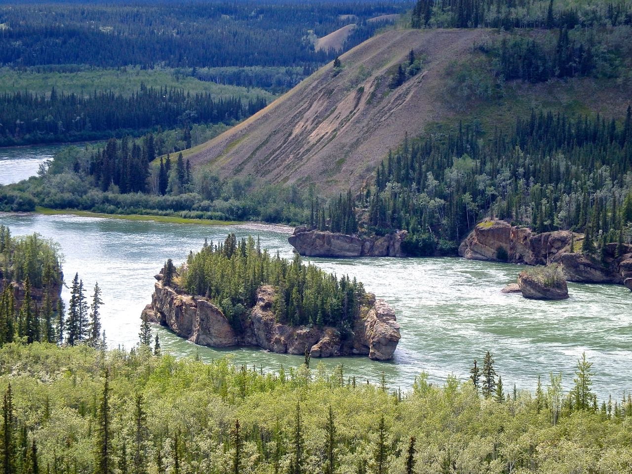 Река юкон относится к бассейну. Река Юкон Канада. Юкон Северная Америка. Река Юкон Северная Америка. Юкон Аляска.