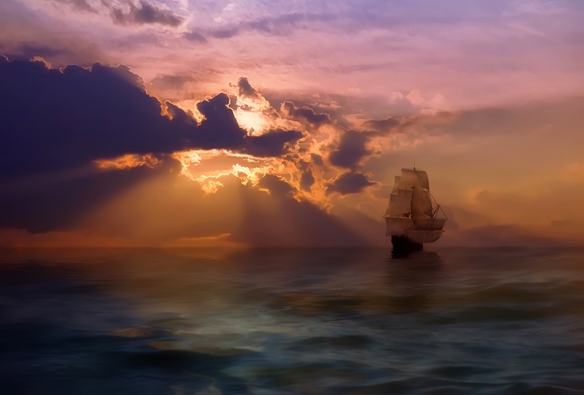 Фото парусника в море на рассвете