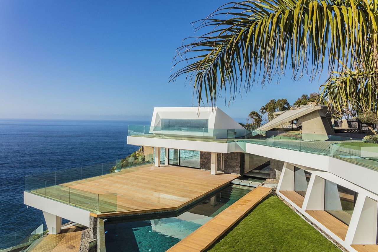 Купить дом на берегу океана в испании снять квартиру в германии цена