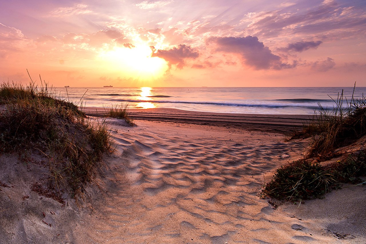 Фото море пляж закат