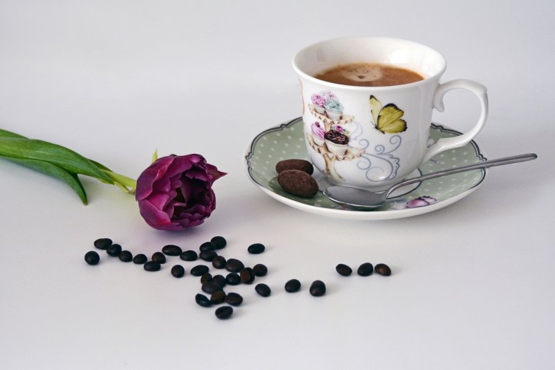 Чашка кофе и цветочек