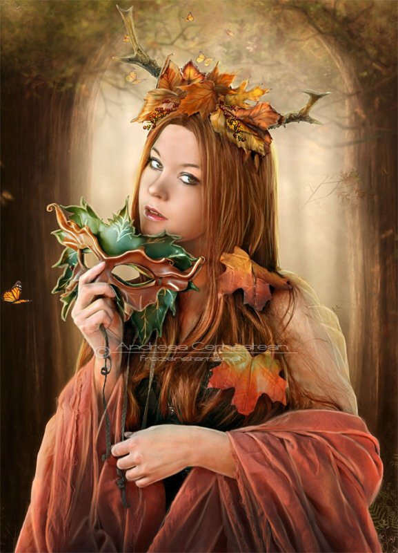 Девушка в венке из осенних листьев