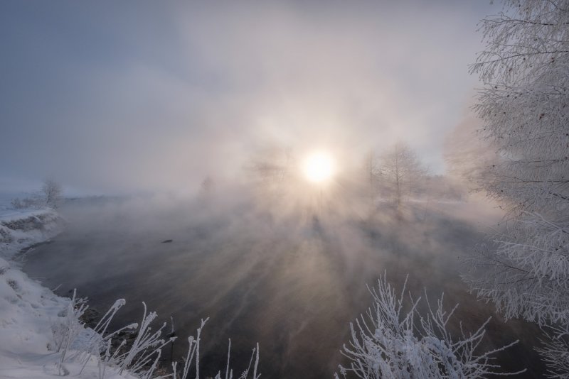Солнце в тумане зимой